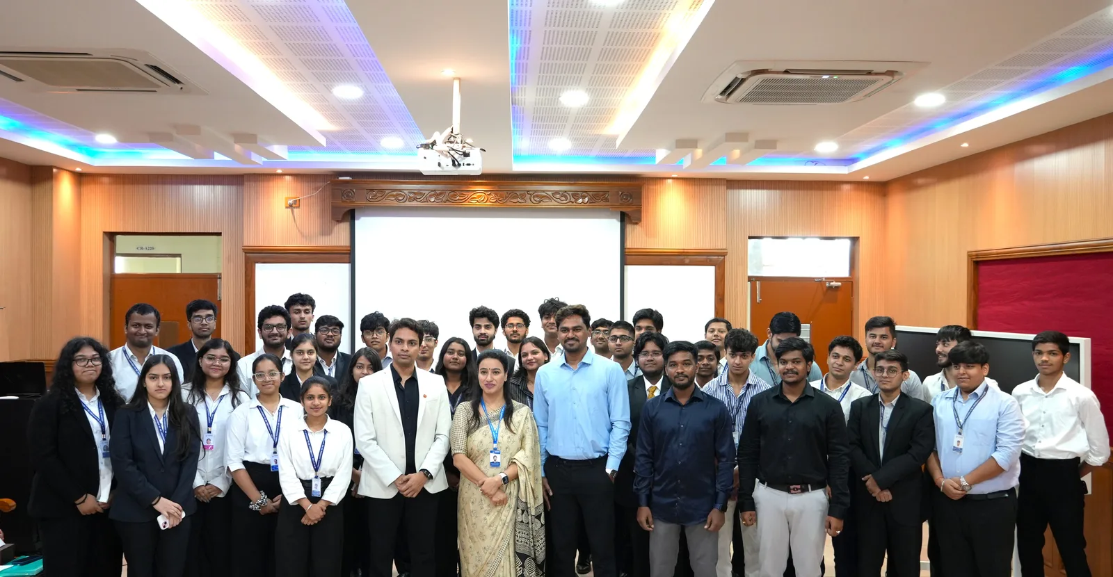 Workshop participants posing for a group photograph.